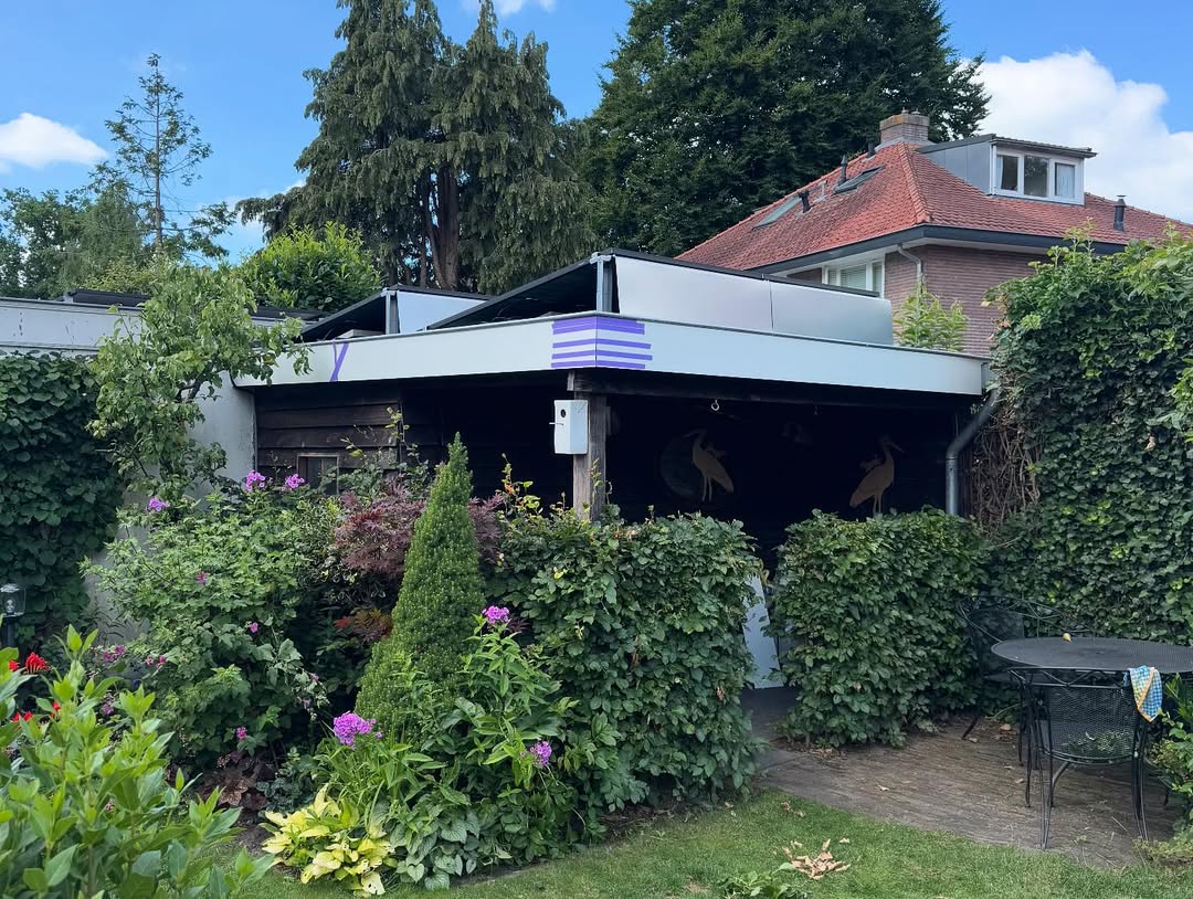 Tuinhuis aanbouw voor renovatie plat dak